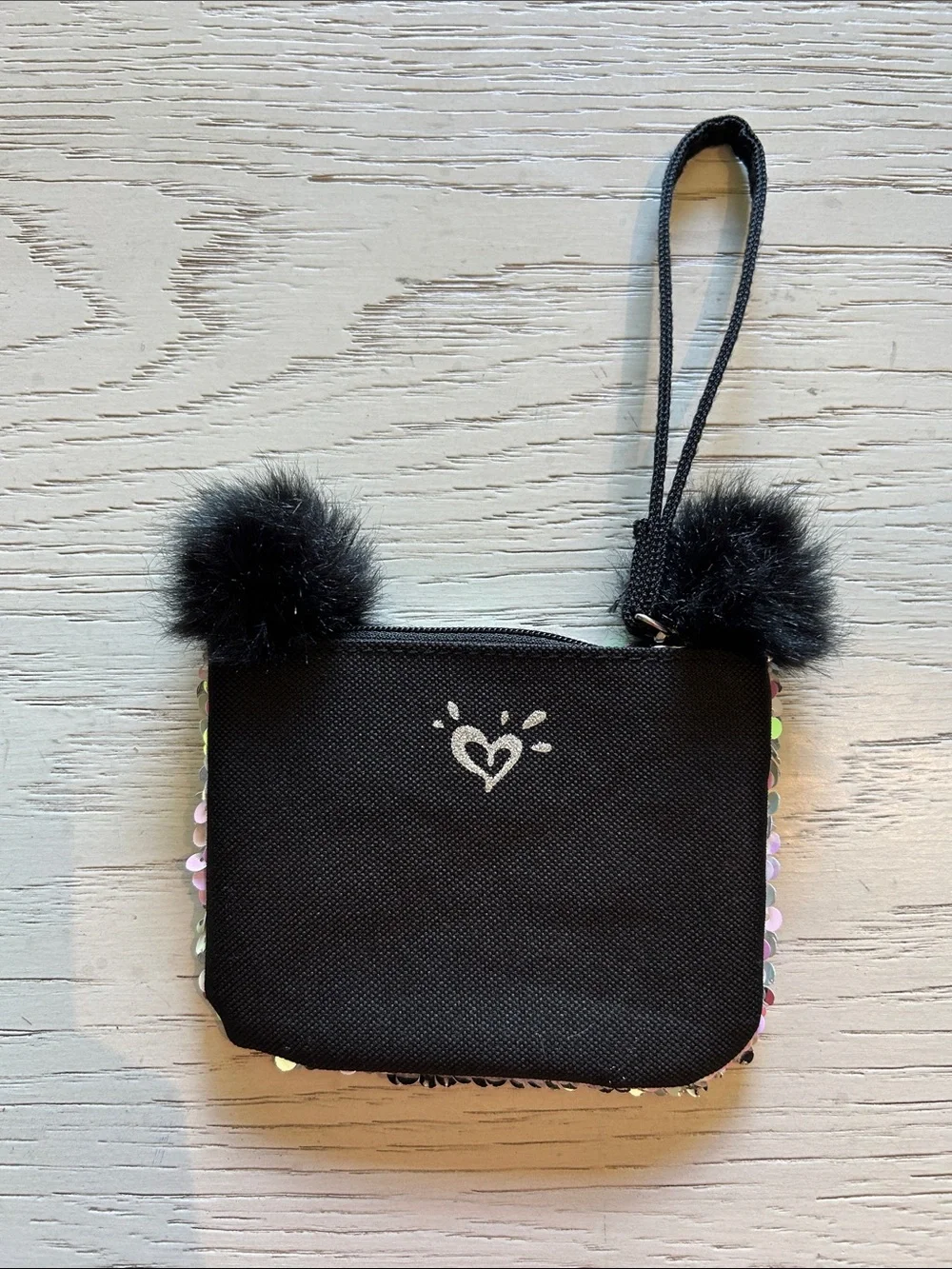 Justice Iridescent Sequin Panda Wristlet with Black Pom Poms
